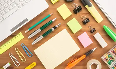 Office supplies on a table.
