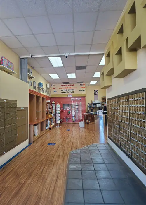Mailbox rentals and tile and wood floor.