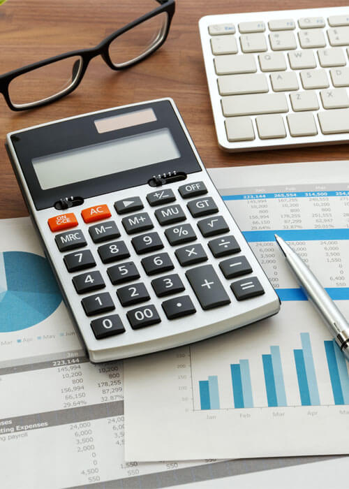 Financial accounting with calculator and financial data.